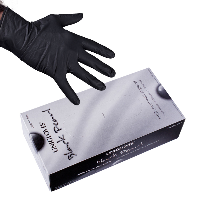 Box of 100 Unigloves Black Pearl black nitrile examination gloves with gloved hand above box